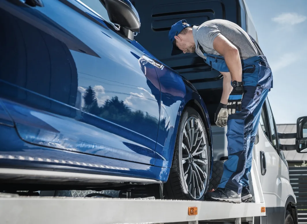 Kansas City local tow truck loading vehicle
