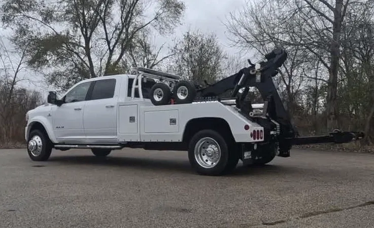 Kansas City wrecker equipment securing damaged vehicle